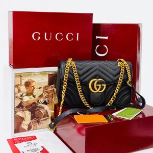 Sac à main Gucci Marmont matelassé avec chaîne dorée