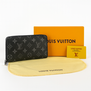 Porte-feuille de luxe à fermeture zippée motif monogramme
